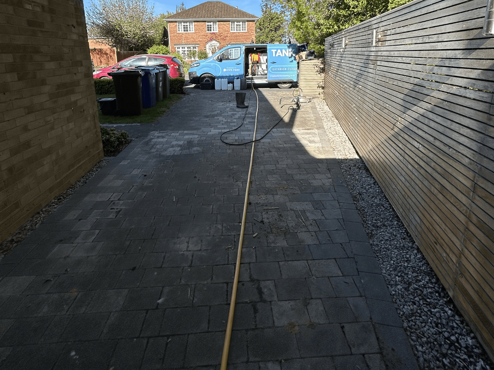 Charcoal block paving before cleaning