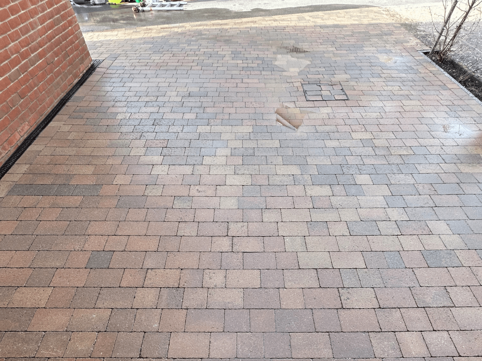 Red block paving driveway after cleaning