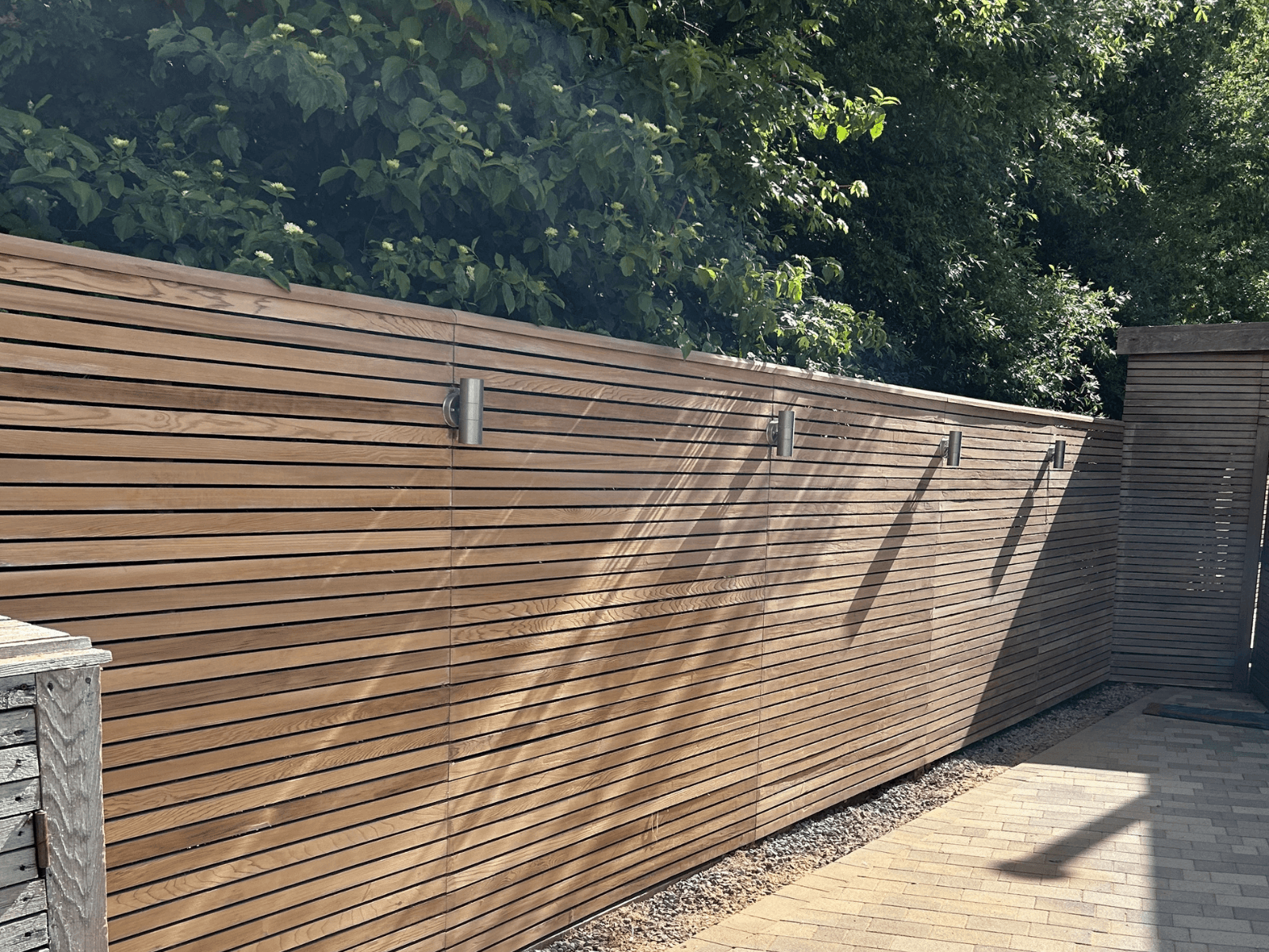 Cedar slatted fence after cleaning