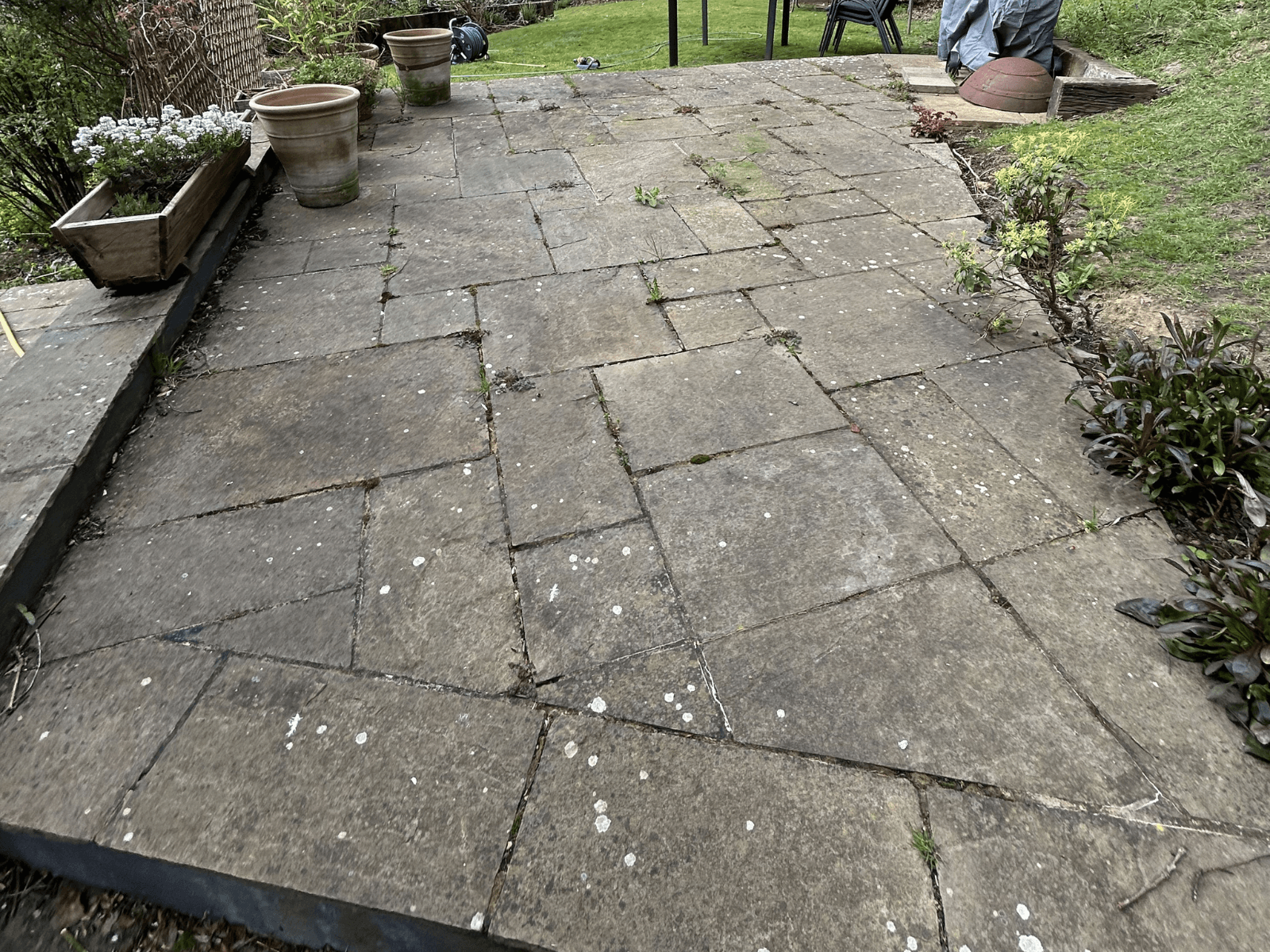 Indian sandstone patio before cleaning