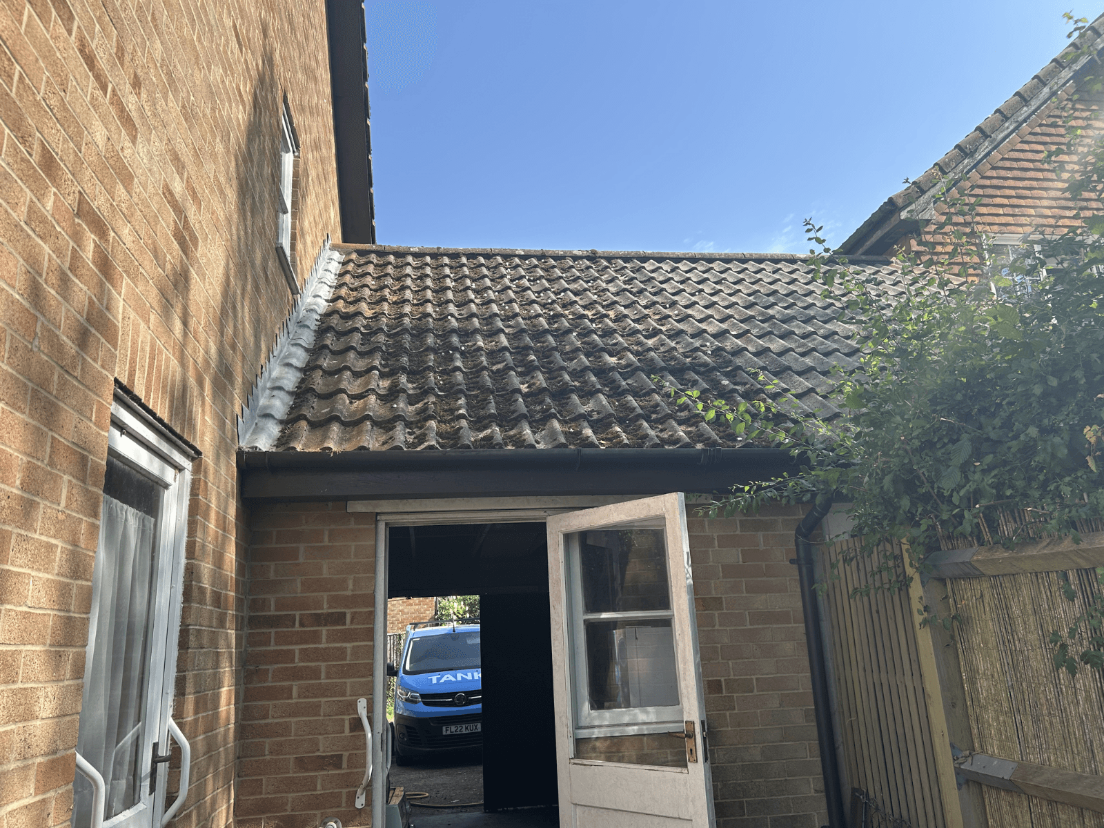 Roof moss removal before cleaning